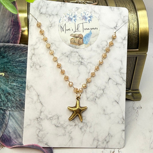 ✨Handmade Doll Jewelry Designed to Fit popular 18 Inch Fashion Dolls: add a little “Summer Fun ☀️ Beachy Style 🏝️” to your favorite doll!✨
Gold Starfish Charm Light Beige Glass Crystal Beaded Chain Doll Necklace