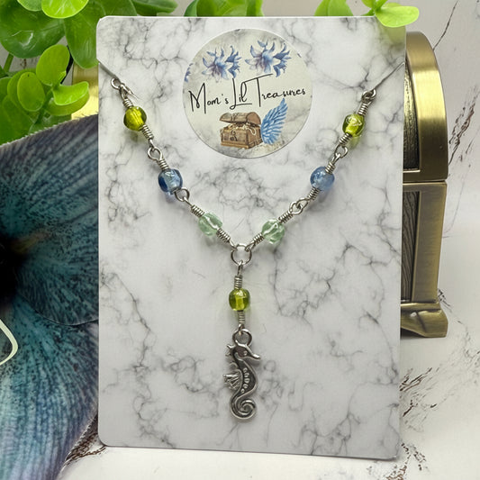 ✨Handmade Doll Jewelry Designed to Fit popular 18 Inch Fashion Dolls: add a little “Summer Fun ☀️ Beachy Style 🏝️” to your favorite doll!✨
Green Blue Glass Beaded Silver Link Chain Seahorse Charm Doll Necklace