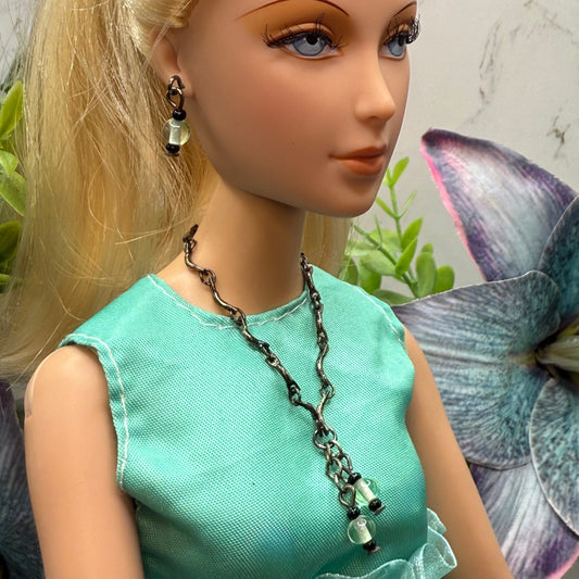 Light Green Black Glass Gunmetal Chain Dangle Doll Necklace & Matching Earrings. The necklace measures 4-3/8 inches long. Necklace and earrings shown on 16” Madame Alexander - Alex doll