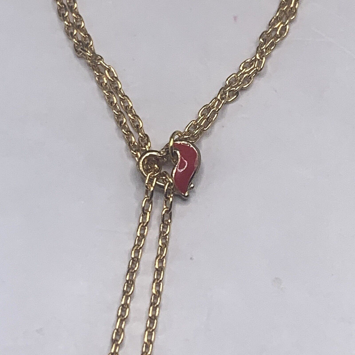 ✨Handmade Doll Jewelry Designed to Fit popular 16 Inch Fashion Dolls: add a stylish touch to your favorite doll!✨

Red Heart Slide Bolo Style Gold tone Chain with Red Crystal end accents Doll Necklace. Necklace measures approximately 4 - 5 inches long with slider style.