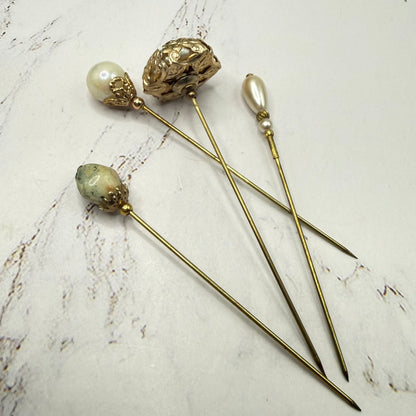 ✨ Handmade Vintage-Inspired Hatpin | Stick Pin | Hat Accessory | Sweater & Hijab Pin | Decorative Jewelry Gift for Her ✨

Set of 4 Stick Pins: Faux Pearl Multi Shape Gold Tone Filigree Ornate Design

