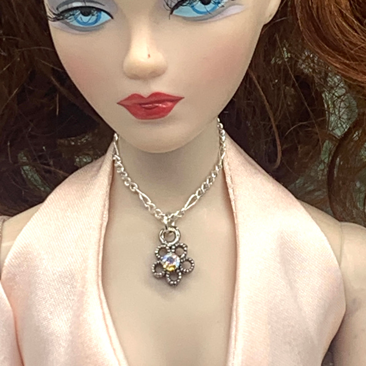 Aurora Borealis Rhinestone Flower Pendant Silver Tone Chain Doll Necklace. The necklace is 2.75 inches long.