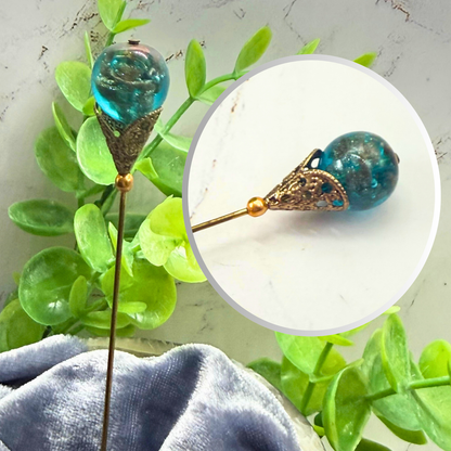 ✨ Handmade Vintage-Inspired Hatpin | Stick Pin | Hat Accessory | Sweater & Hijab Pin | Decorative Jewelry Gift for Her ✨

Vintage-Style Aqua Blue Glass Embedded Metallic Flecks Filigree Cone Base Hatpin - 6 inch
