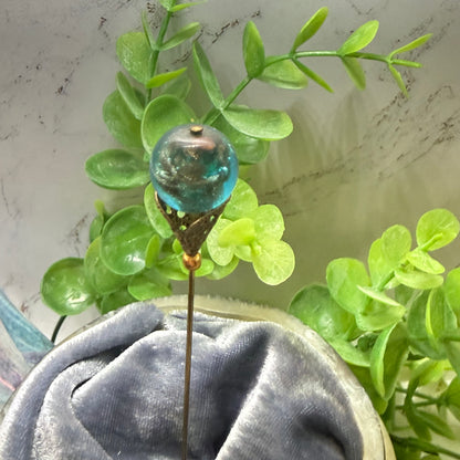 ✨ Handmade Vintage-Inspired Hatpin | Stick Pin | Hat Accessory | Sweater & Hijab Pin | Decorative Jewelry Gift for Her ✨

Vintage-Style Aqua Blue Glass Embedded Metallic Flecks Filigree Cone Base Hatpin - 6 inch