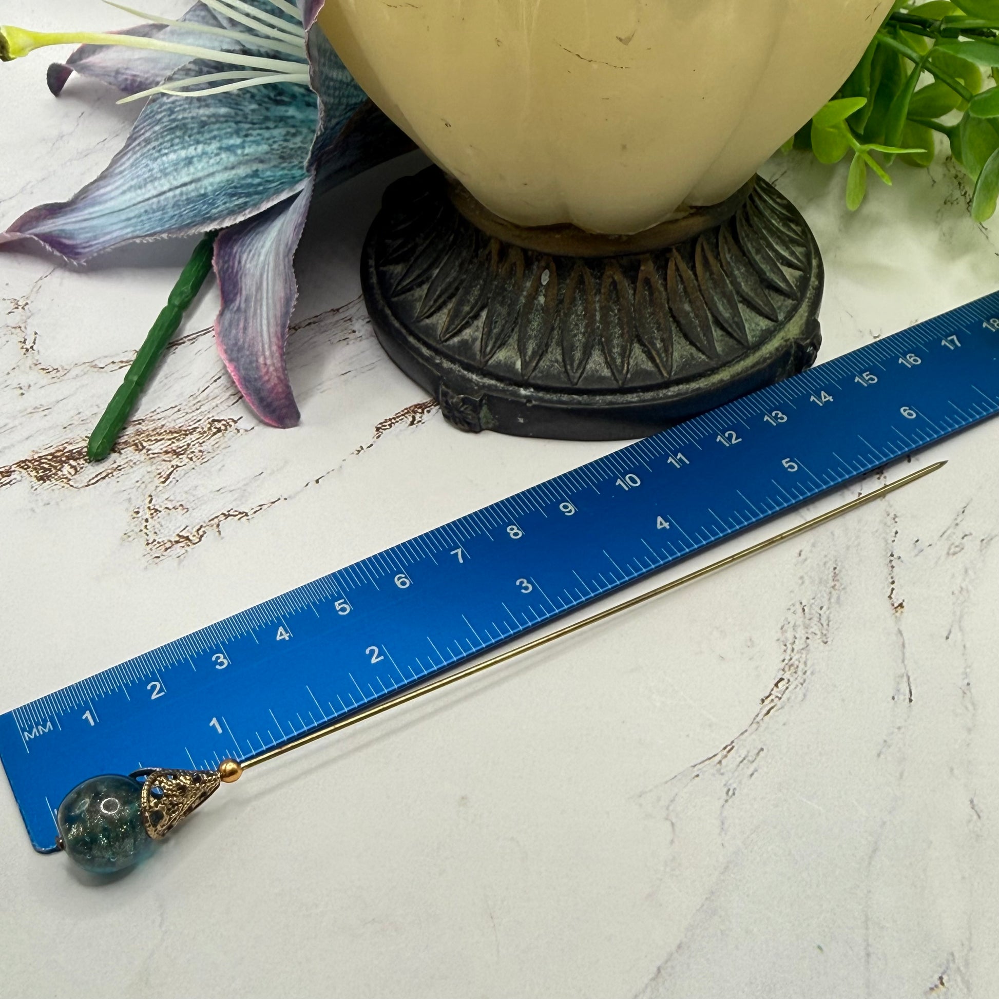 ✨ Handmade Vintage-Inspired Hatpin | Stick Pin | Hat Accessory | Sweater & Hijab Pin | Decorative Jewelry Gift for Her ✨

Vintage-Style Aqua Blue Glass Embedded Metallic Flecks Filigree Cone Base Hatpin - 6 inch