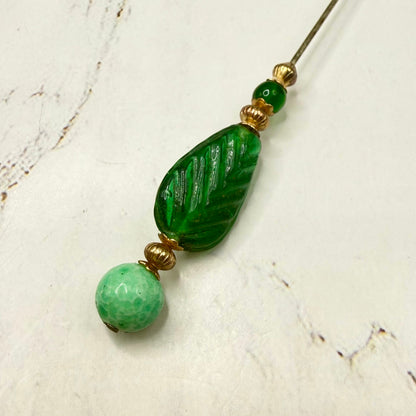✨ Handmade Vintage-Inspired Hatpin | Stick Pin | Hat Accessory | Sweater & Hijab Pin | Decorative Jewelry Gift for Her ✨

Art Deco Style Green Glass Leaf Design -Mottled Light Green Round Top Finial Hatpin - 6 Inch