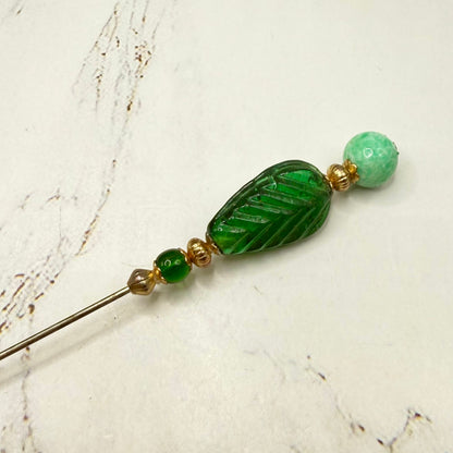 ✨ Handmade Vintage-Inspired Hatpin | Stick Pin | Hat Accessory | Sweater & Hijab Pin | Decorative Jewelry Gift for Her ✨

Art Deco Style Green Glass Leaf Design -Mottled Light Green Round Top Finial Hatpin - 6 Inch