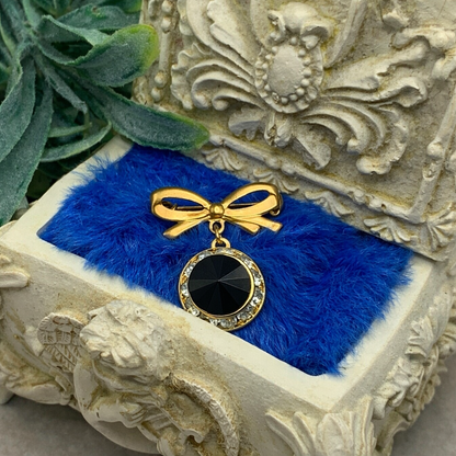 Gold Tone Bow Pin Black & Clear Rhinestone Dangle Doll Brooch