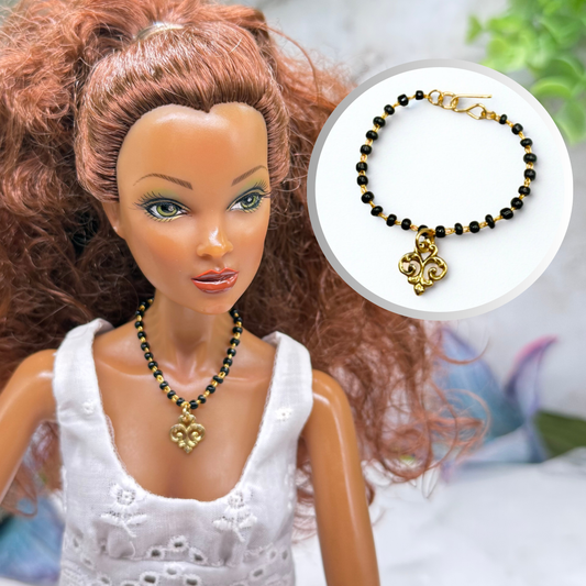 Black Glass Beaded Gold Chain Filigree Pendant Doll Necklace • Necklace measures 3-5/8 inches long • Necklace shown on 16 Inch Spellbound Valentina doll 