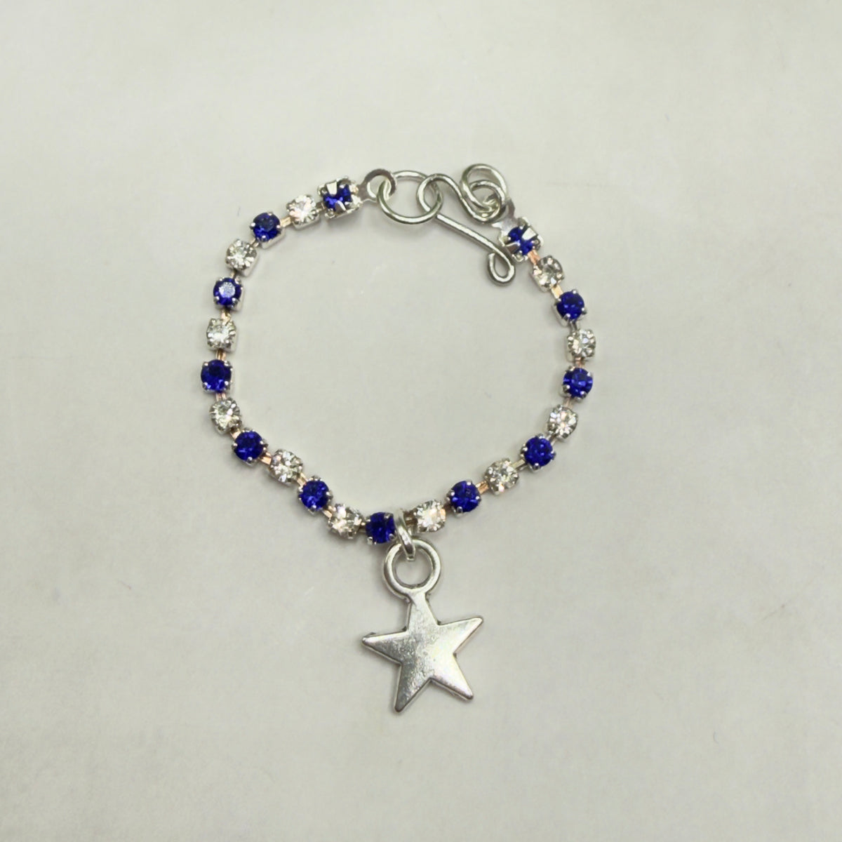 ✨Handmade Doll Jewelry Designed to Fit popular 16 Inch Fashion Dolls: add a touch of “Patriotic Flare 🇺🇸” to your favorite doll!✨

Blue & Clear Rhinestone Silver Star Charm Doll Necklace