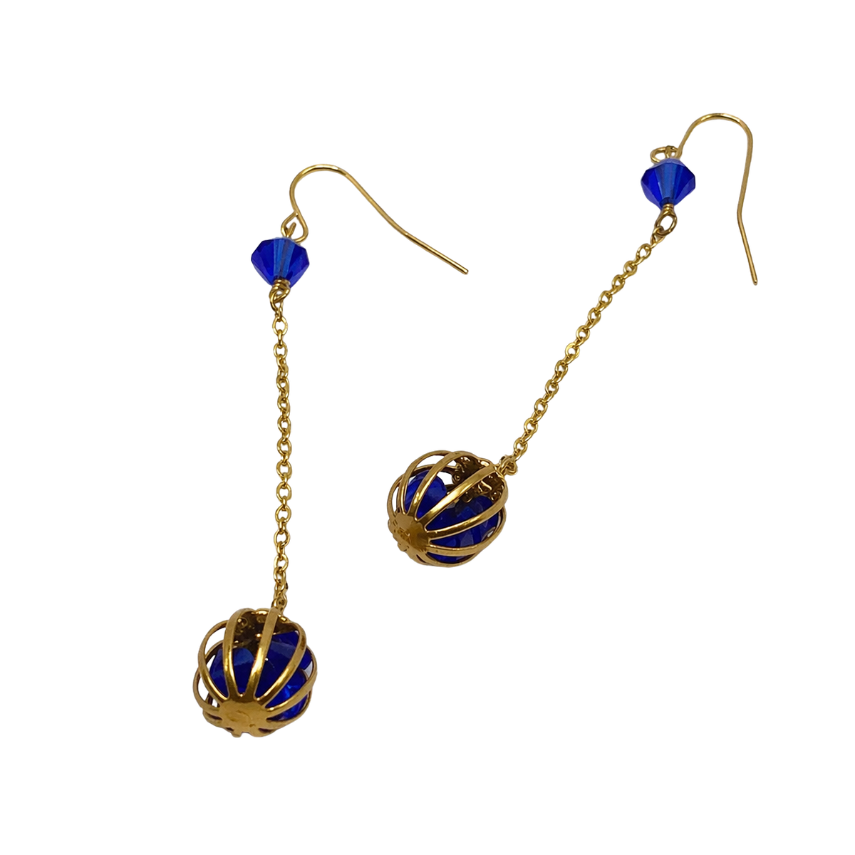 These earrings feature a cage bead suspended on gold tone chain. Sparkly blue crystals inside the cage bead and accent. These earrings measure 2.75 inches in length with hook closurer.