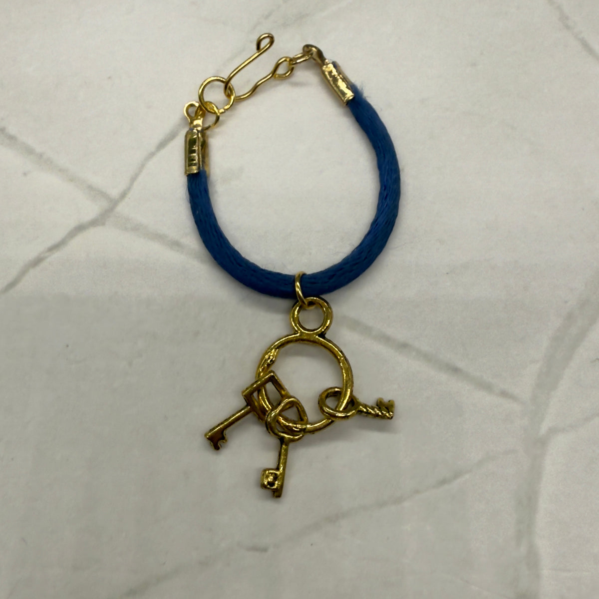✨ Handmade Doll Jewelry Designed to Fit popular 14 Inch Fashion Dolls: add a stylish touch to your favorite doll!✨

Blue Fabric Cord Doll Necklace with Gold tone Keys Pendant charm. The necklace cord measures 3-7/8 inches in length. 