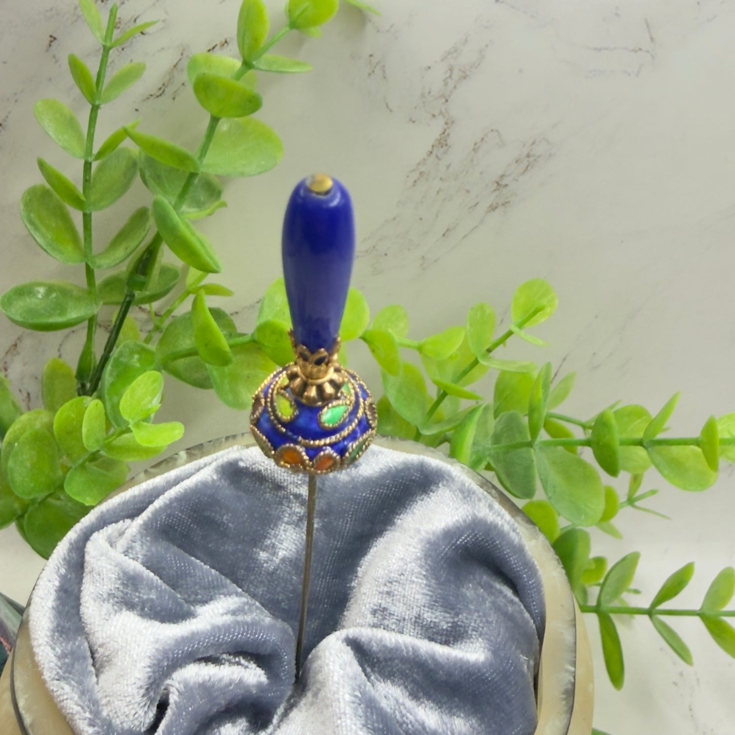 ✨Handmade Vintage Inspired Hatpin, Stick Pin, Gifts for Her, Hat Accessory, Jewelry Decor✨

Blue Glass Tapered Final Multi Color Floral Design Cloisonné Gold Tone Filigree Accent Hatpin - 6 Inch