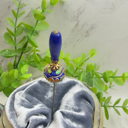 ✨Handmade Vintage Inspired Hatpin, Stick Pin, Gifts for Her, Hat Accessory, Jewelry Decor✨

Blue Glass Tapered Final Multi Color Floral Design Cloisonné Gold Tone Filigree Accent Hatpin - 6 Inch