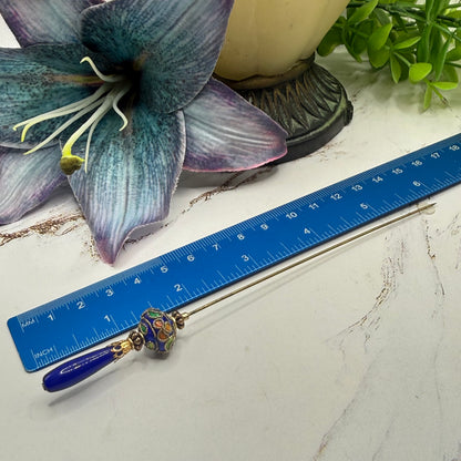 ✨Handmade Vintage Inspired Hatpin, Stick Pin, Gifts for Her, Hat Accessory, Jewelry Decor✨

Blue Glass Tapered Final Multi Color Floral Design Cloisonné Gold Tone Filigree Accent Hatpin - 6 Inch