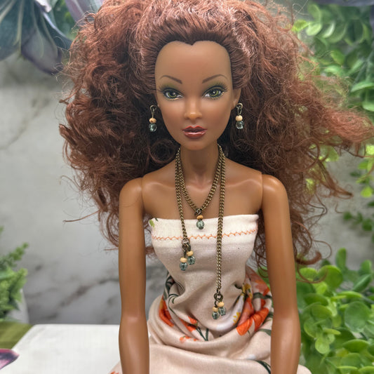 Trendy style Blue Glass Beige Beaded Dangle Doll Necklace Earring Set. Necklace has a layered lariat tassel style. The necklace (chain that clasps around neck) measures 3.75 inches long. The two long sides measure 3.5” & 2.75” long. Necklace and earrings shown on 16” Madame Alexander - Alex doll