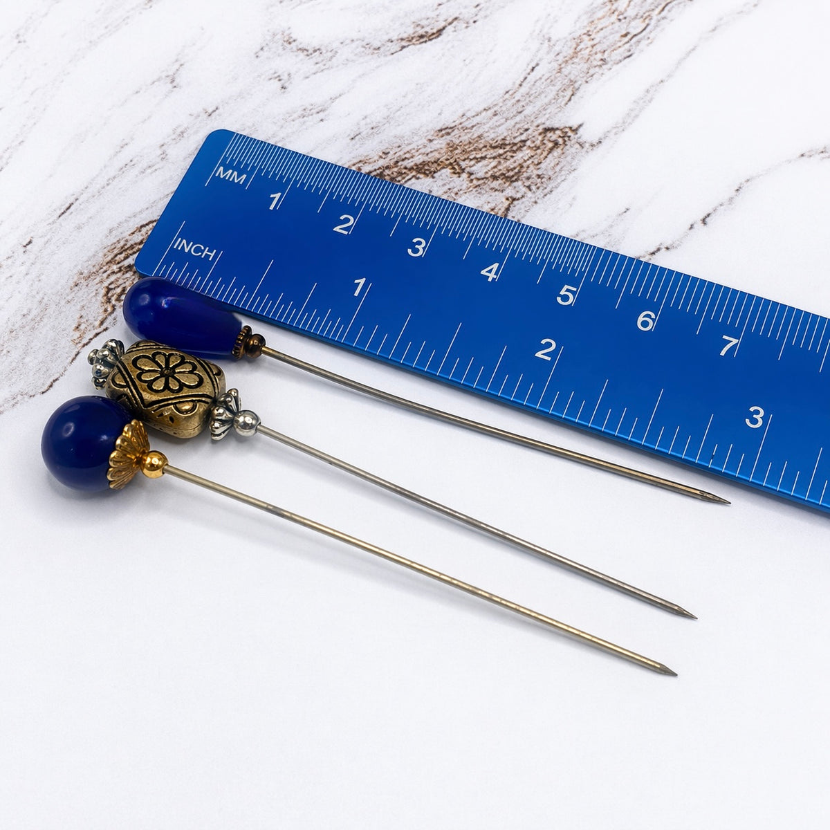 ✨ Handmade Vintage-Inspired Hatpin | Stick Pin | Hat Accessory | Sweater & Hijab Pin | Decorative Jewelry Gift for Her ✨

This handmade blue glass silver filigree pin set includes 3 stick pins/ hatpins / sewing quilting pins.