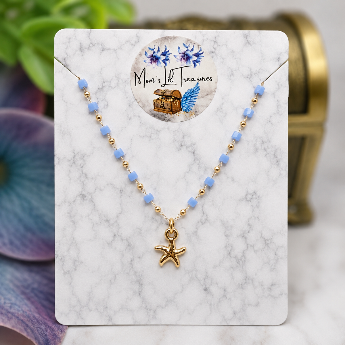 ✨Handmade Doll Jewelry Designed to Fit popular 18 Inch Fashion Dolls: add a little “Summer Fun ☀️ Beachy Style 🏝️” to your favorite doll!✨

Blue Square Round Gold Beaded Chain Gold Starfish Charm Doll Necklace
