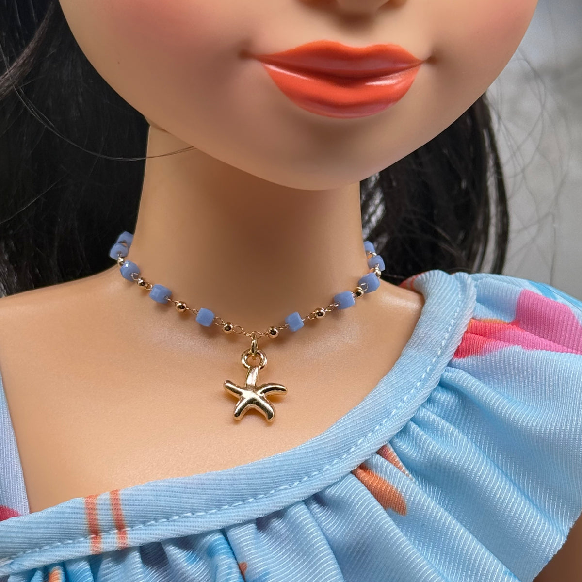 ✨Handmade Doll Jewelry Designed to Fit popular 18 Inch Fashion Dolls: add a little “Summer Fun ☀️ Beachy Style 🏝️” to your favorite doll!✨

Blue Square Round Gold Beaded Chain Gold Starfish Charm Doll Necklace
