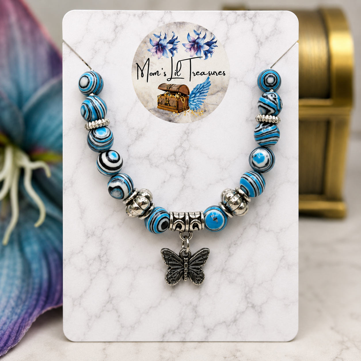 ✨Handmade Jewelry Designed to fit popular 17 to 20 cm (6 to 7 inch) Plushie Labubu Monster Dolls: add a stylish touch to your favorite plushie! ✨

Blue White Black Swirl Glass Beaded Silver Butterfly Charm Necklace