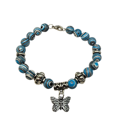 ✨Handmade Jewelry Designed to fit popular 17 to 20 cm (6 to 7 inch) Plushie Labubu Monster Dolls: add a stylish touch to your favorite plushie! ✨

Blue White Black Swirl Glass Beaded Silver Butterfly Charm Necklace