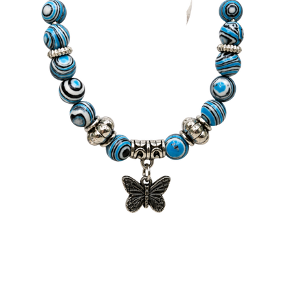 ✨Handmade Jewelry Designed to fit popular 17 to 20 cm (6 to 7 inch) Plushie Labubu Monster Dolls: add a stylish touch to your favorite plushie! ✨

Blue White Black Swirl Glass Beaded Silver Butterfly Charm Necklace