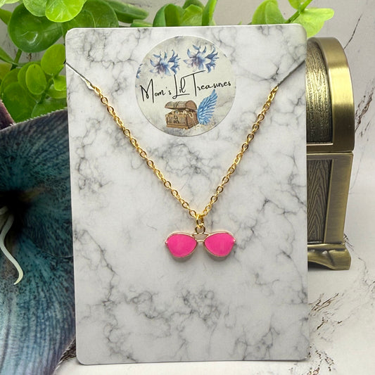✨Handmade Doll Jewelry Designed to Fit popular 18 Inch Fashion Dolls: add a little “Summer Fun 😎” to your favorite doll!✨

Bright Pink Sunglasses Charm Gold Chain Doll Necklace