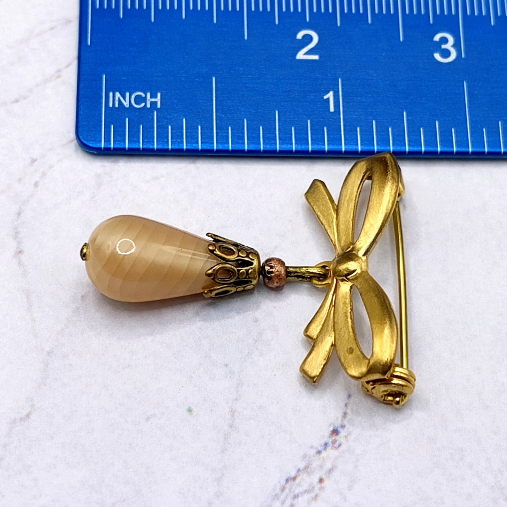 Tan Beige Glass Teardrop Pendant with Gold Tone Bow Pin • Doll Brooch