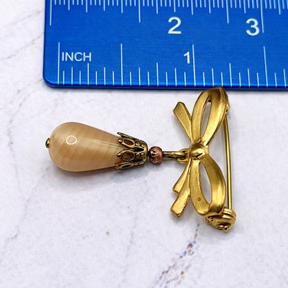 Tan Beige Glass Teardrop Pendant with Gold Tone Bow Pin • Doll Brooch