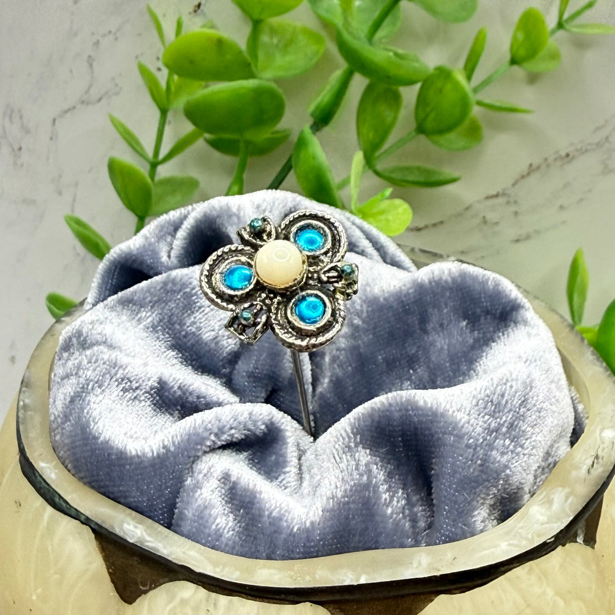 ✨ Handmade Vintage-Inspired Hatpin | Stick Pin | Hat Accessory | Sweater & Hijab Pin | Decorative Jewelry Gift for Her ✨

Celtic Clover Shaped Metal Topper with White Glass Cabochon Center Vibrant bright blue enamel accents - 3 Inch Hatpin
