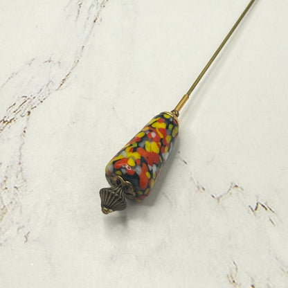 ✨ Handmade Vintage-Inspired Hatpin | Stick Pin | Hat Accessory | Sweater & Hijab Pin | Decorative Jewelry Gift for Her ✨

Cone Shape Glass Multicolor Speckle Pattern  Red Orange Yellow Black - 6 Inch Hatpin