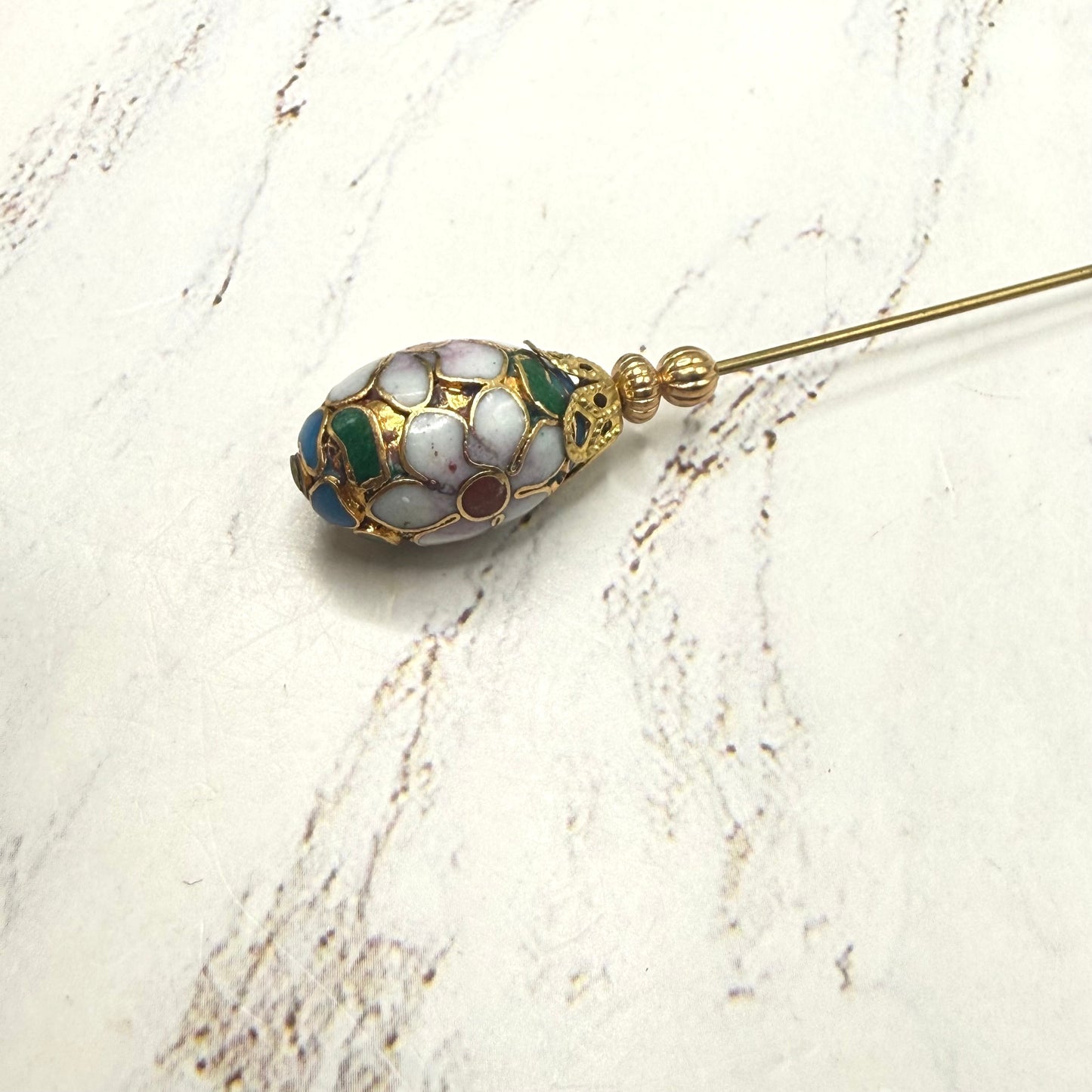 ✨ Handmade Vintage-Inspired Hatpin | Stick Pin | Hat Accessory | Sweater & Hijab Pin | Decorative Jewelry Gift for Her ✨

Floral Multi-colored Design Cloisonné Egg Shaped with Gold-tone Filigree Accent Hatpin - 6 Inch