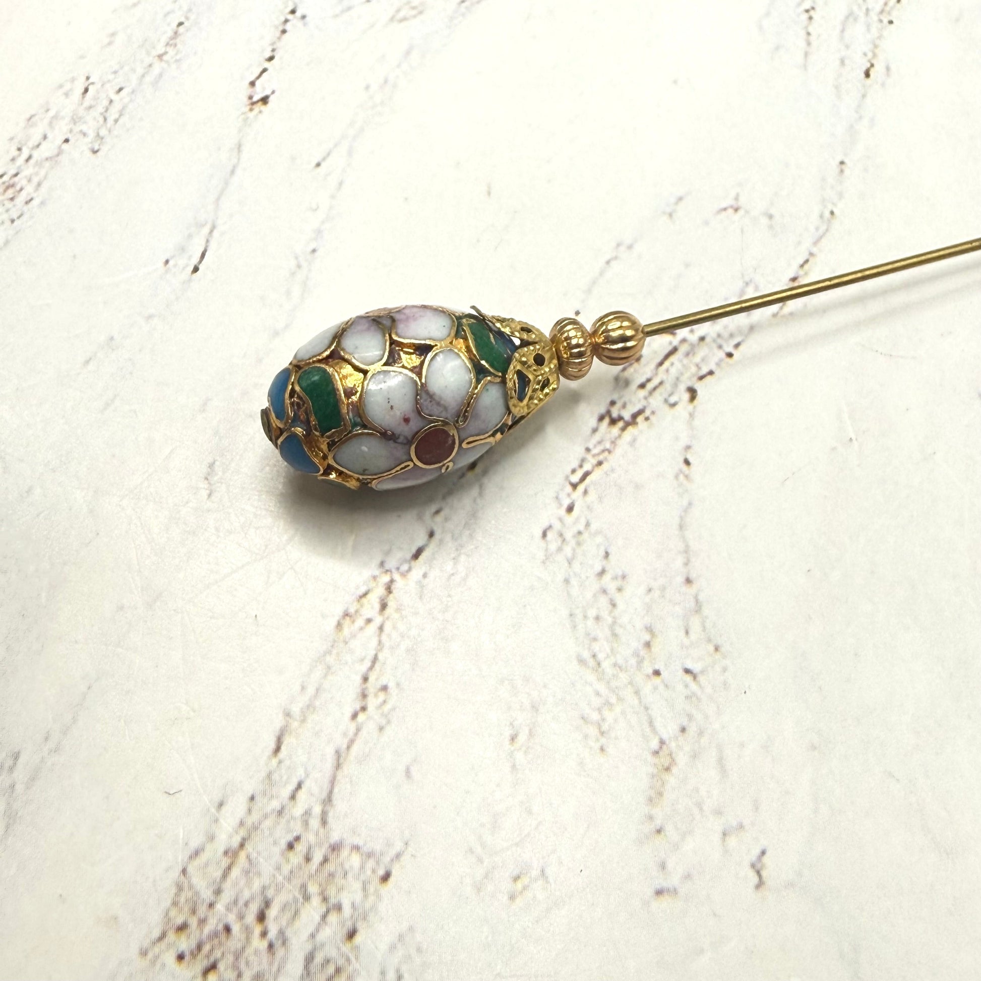 ✨ Handmade Vintage-Inspired Hatpin | Stick Pin | Hat Accessory | Sweater & Hijab Pin | Decorative Jewelry Gift for Her ✨

Floral Multi-colored Design Cloisonné Egg Shaped with Gold-tone Filigree Accent Hatpin - 6 Inch