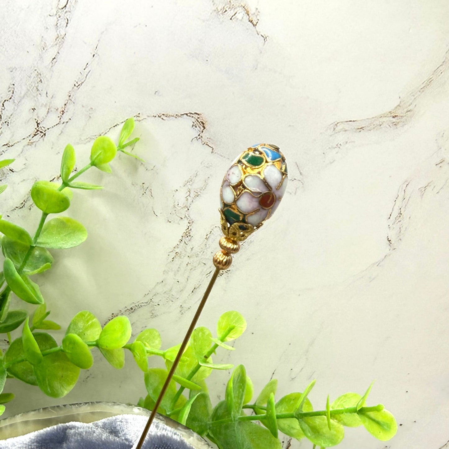 ✨ Handmade Vintage-Inspired Hatpin | Stick Pin | Hat Accessory | Sweater & Hijab Pin | Decorative Jewelry Gift for Her ✨

Floral Multi-colored Design Cloisonné Egg Shaped with Gold-tone Filigree Accent Hatpin - 6 Inch
