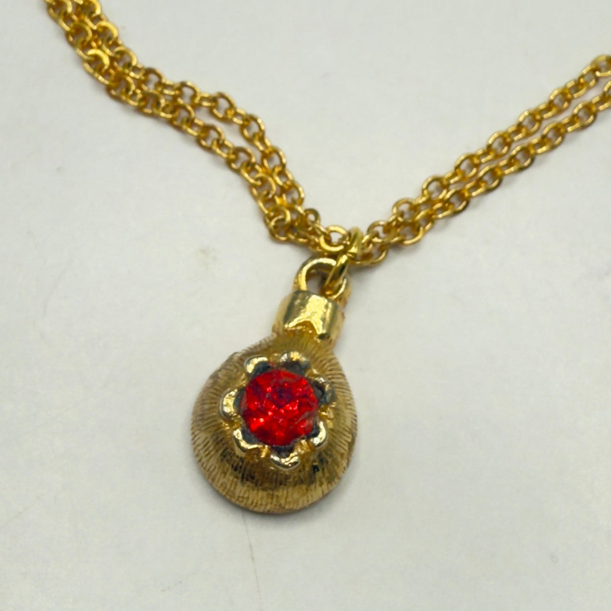 ✨Handmade  Jewelry for 18 Inch Fashion Dolls -  American Girl • Our Generation • Journey Girl • My Life As • Adora • and more✨

Gold Christmas Ornament Charm Red Rhinestone Doll Necklace