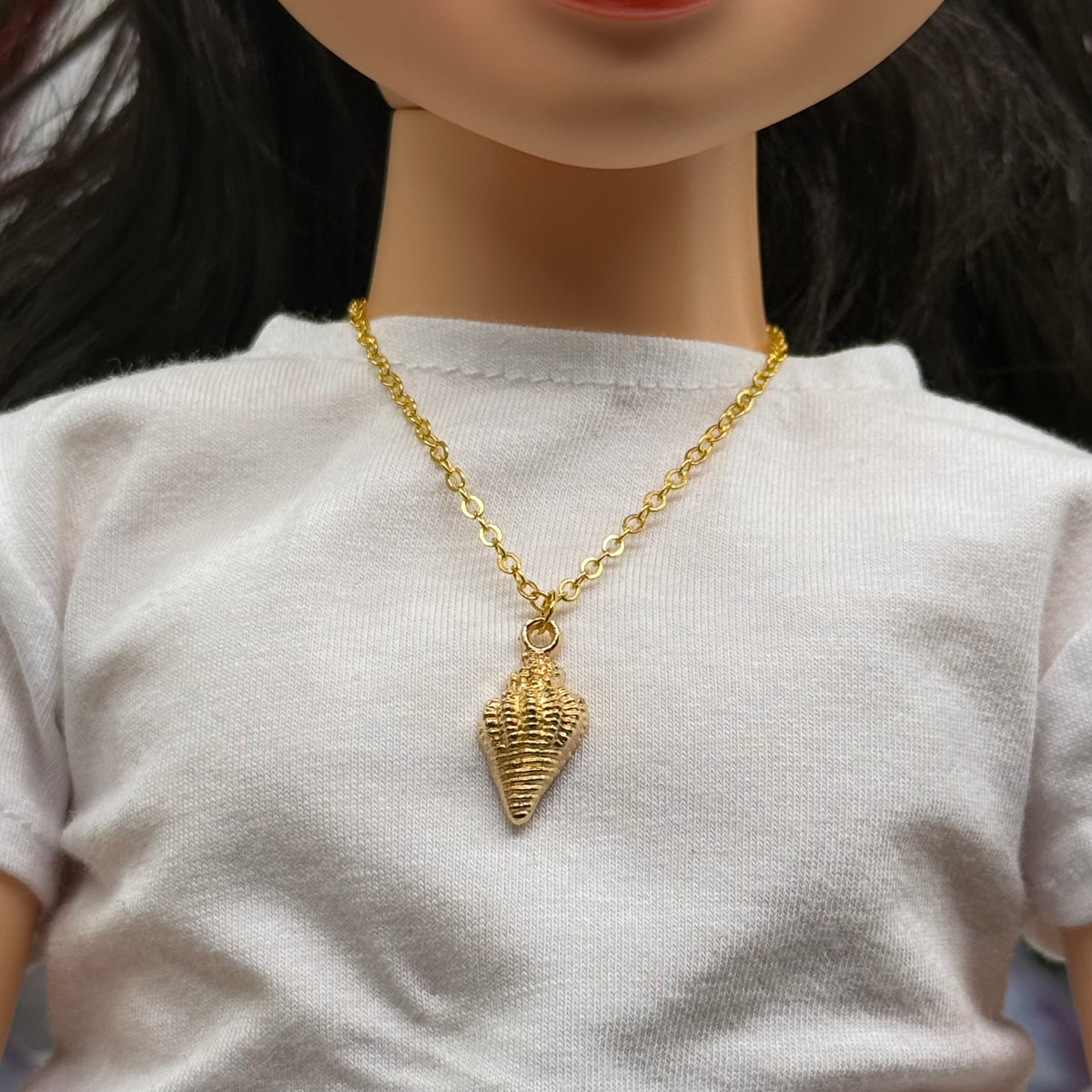 ✨ Handmade Doll Jewelry Designed to Fit popular 18 Inch Fashion Dolls: add a stylish touch to your favorite doll ✨

Gold Conch Shell Beach Charm Doll Necklace