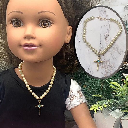 ✨Handmade Doll Jewelry Designed to Fit popular 18 Inch Fashion Dolls: add a touch of religious elegance and spirituality to your favorite doll!✨

Gold Cross Pendant with Turquoise Blue Rhinestone accent. 7.5 inch long, Chain Strung faux Pearl Doll Necklace.