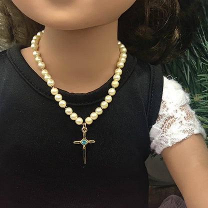 ✨Handmade Doll Jewelry Designed to Fit popular 18 Inch Fashion Dolls: add a touch of religious elegance and spirituality to your favorite doll!✨

Gold Cross Pendant with Turquoise Blue Rhinestone accent. 7.5 inch long, Chain Strung faux Pearl Doll Necklace.