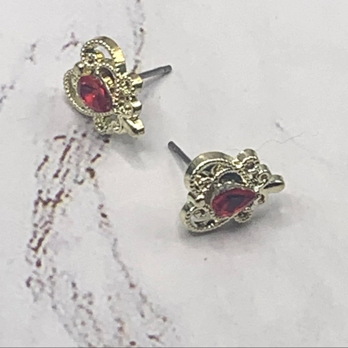 ✨Handmade Doll Jewelry Designed to Fit popular 18 Inch Fashion Dolls: add a stylish touch to your favorite doll!✨

Gold Filigree Red Rhinestone accented Heart Post Doll Earrings.