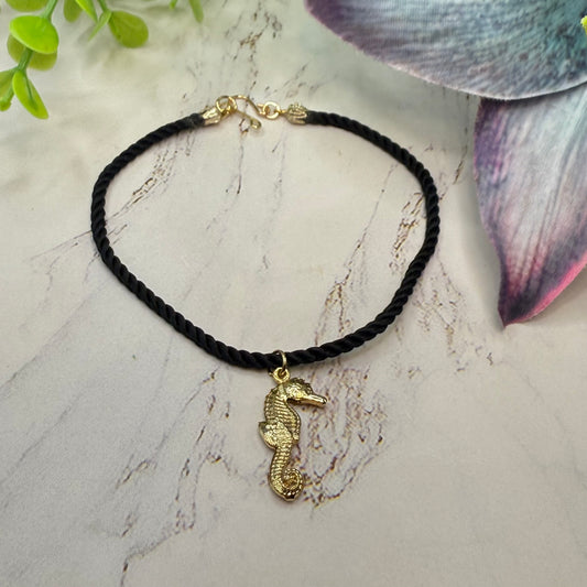 ✨Handmade Doll Jewelry Designed to Fit popular 18 Inch Fashion Dolls: add a little “Summer Fun ☀️ Beachy Style” to your favorite doll!✨

Gold Seahorse Pendant Black Fabric Cord Doll Necklace. Necklace measures 8.5 inches long.