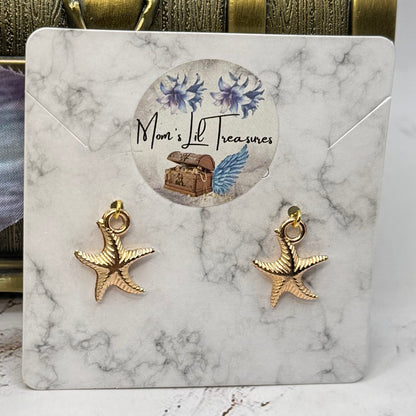 ✨Handmade Doll Jewelry Designed to Fit popular 18 Inch Fashion Dolls: add a little “Summer Fun ☀️ Beachy Style 🏝️” to your favorite doll!✨

Gold Starfish Beach Theme Doll Earrings
