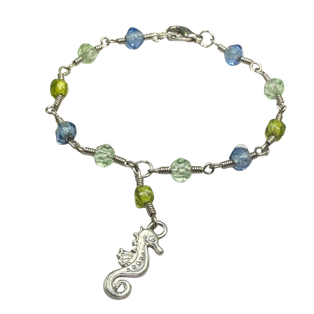 ✨Handmade Doll Jewelry Designed to Fit popular 18 Inch Fashion Dolls: add a little “Summer Fun ☀️ Beachy Style 🏝️” to your favorite doll!✨

Green Blue Glass Beaded Silver Link Chain Seahorse Charm Doll Necklace