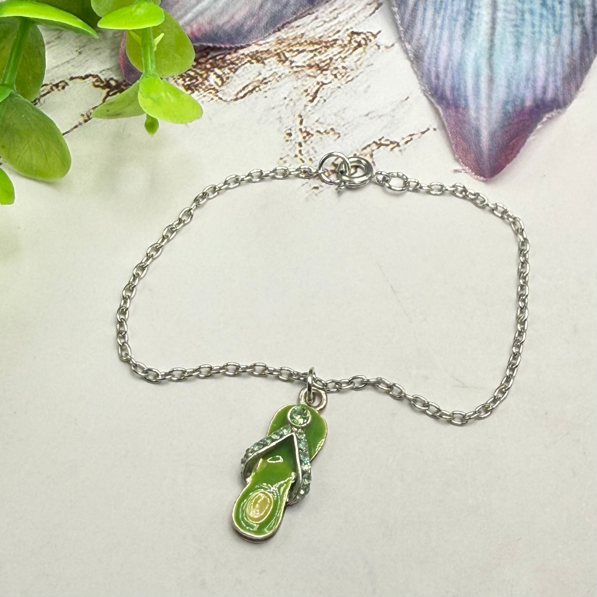 ✨Handmade Doll Jewelry Designed to Fit popular 18 Inch Fashion Dolls: add a little “Summer Fun ☀️” to your favorite doll!✨

Green Enamel Rhinestone Flip Flop Charm Silver Doll Necklace
