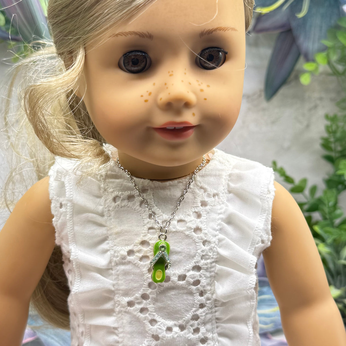 ✨Handmade Doll Jewelry Designed to Fit popular 18 Inch Fashion Dolls: add a little “Summer Fun ☀️” to your favorite doll!✨

Green Enamel Rhinestone Flip Flop Charm Silver Doll Necklace

