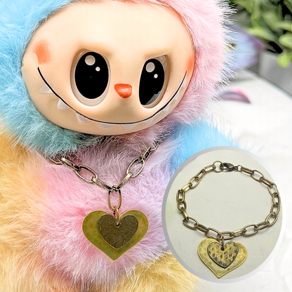 ✨Handmade Jewelry Designed to fit popular 17 to 20 cm (6 to 7 inch) Plushie Labubu Monster Dolls: add a stylish touch to your favorite plushie! ✨

Hammered 2 Tone Bronze Heart Charm Chunky Oval Link Necklace
