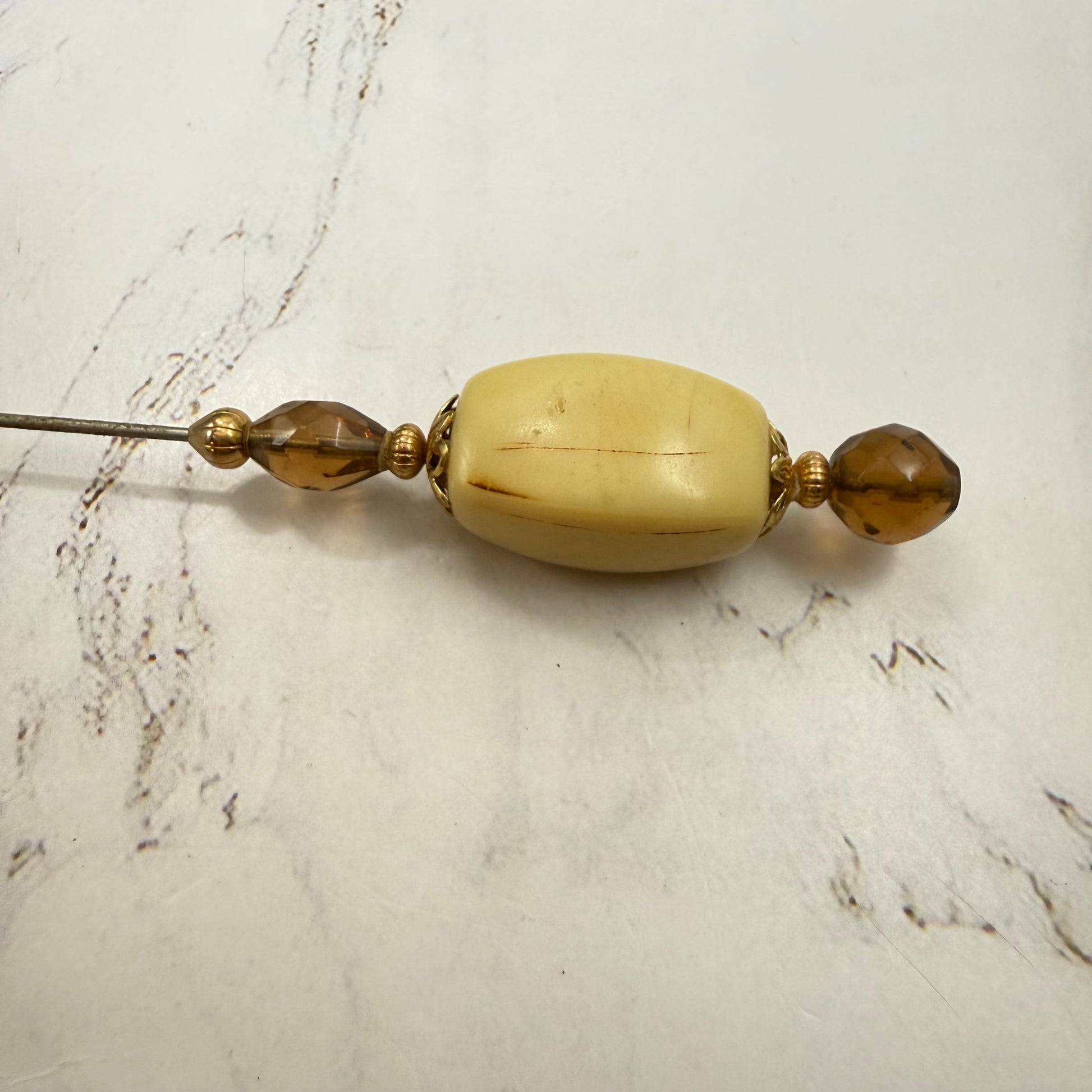 ✨ Handmade Vintage-Inspired Hatpin | Stick Pin | Hat Accessory | Sweater & Hijab Pin | Decorative Jewelry Gift for Her ✨

Large Rounded Rectangular Acrylic Ivory Color Central Bead Gold Tone Filigree Amber Color Faceted Glass Crystal Hatpin - 7.25 Inch