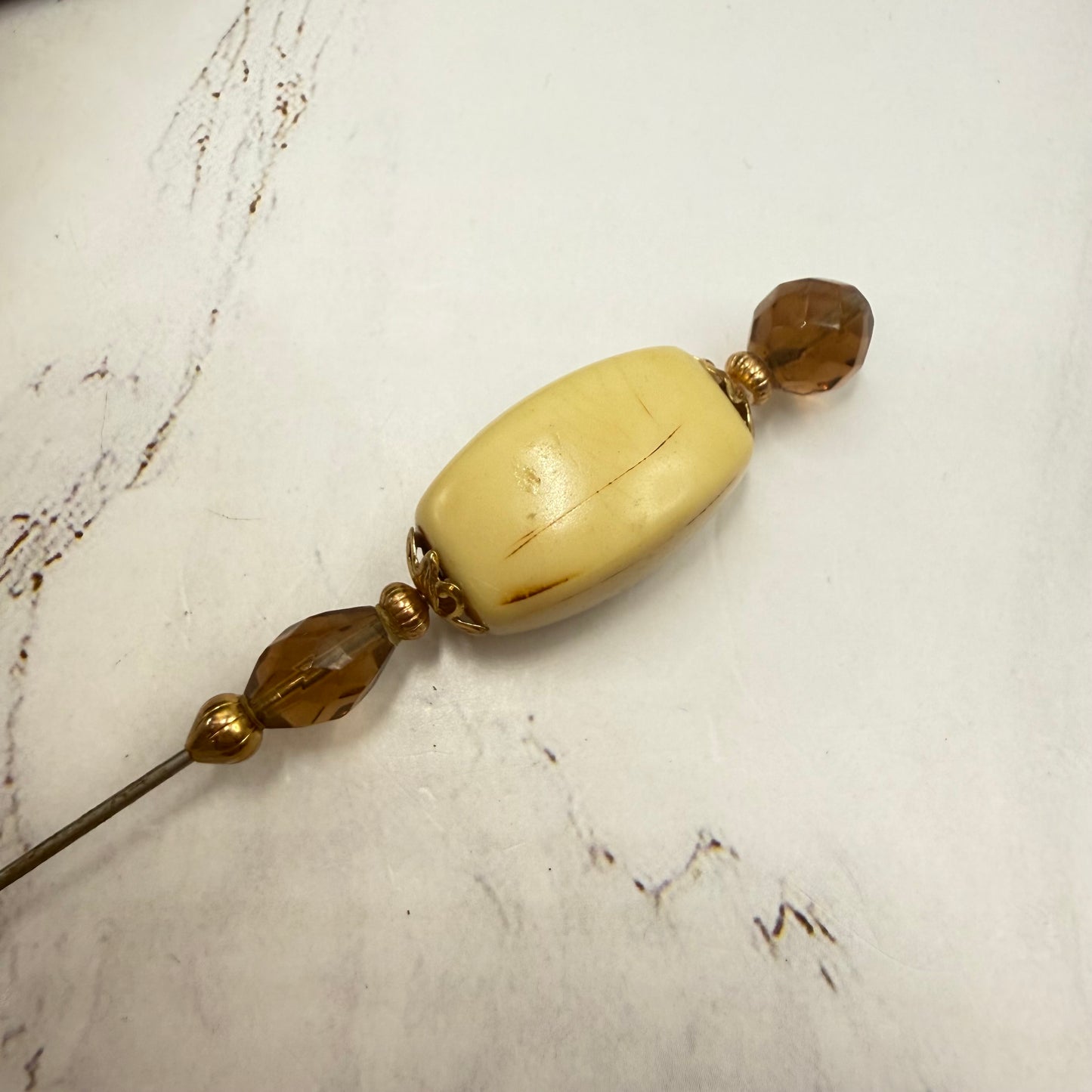 ✨ Handmade Vintage-Inspired Hatpin | Stick Pin | Hat Accessory | Sweater & Hijab Pin | Decorative Jewelry Gift for Her ✨

Large Rounded Rectangular Acrylic Ivory Color Central Bead Gold Tone Filigree Amber Color Faceted Glass Crystal Hatpin - 7.25 Inch