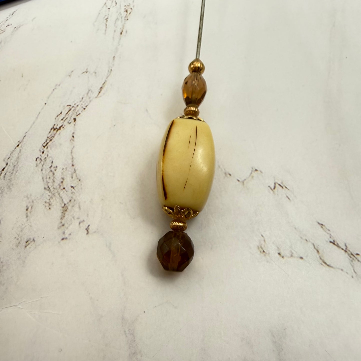 ✨ Handmade Vintage-Inspired Hatpin | Stick Pin | Hat Accessory | Sweater & Hijab Pin | Decorative Jewelry Gift for Her ✨

Large Rounded Rectangular Acrylic Ivory Color Central Bead Gold Tone Filigree Amber Color Faceted Glass Crystal Hatpin - 7.25 Inch