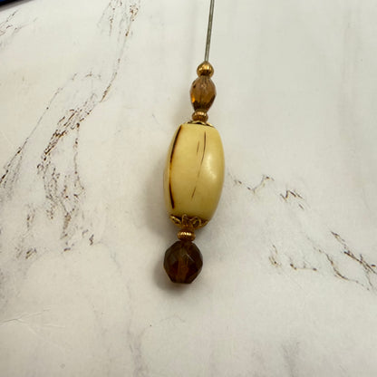 ✨ Handmade Vintage-Inspired Hatpin | Stick Pin | Hat Accessory | Sweater & Hijab Pin | Decorative Jewelry Gift for Her ✨

Large Rounded Rectangular Acrylic Ivory Color Central Bead Gold Tone Filigree Amber Color Faceted Glass Crystal Hatpin - 7.25 Inch