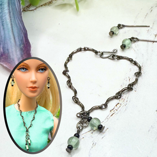 Light Green Black Glass Gunmetal Chain Dangle Doll Necklace & Matching Earrings. The necklace measures 4-3/8 inches long. Necklace and earrings shown on 16” Madame Alexander - Alex doll